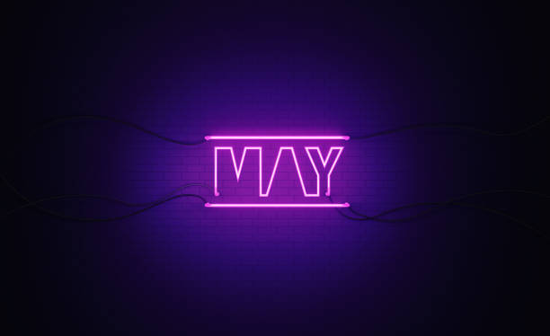 istock Purple Neon Light Writes May on Black Bricked Wall 1291282333