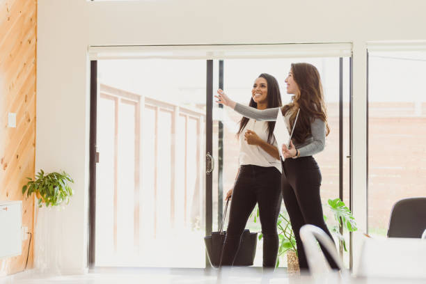istock Real Estate Agent shows home to potential buyer 1291284690