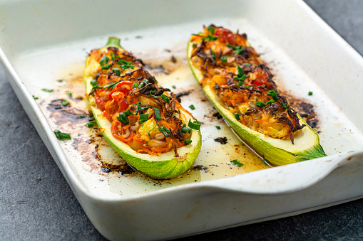 Stuffed zucchini with chicken and vegetables