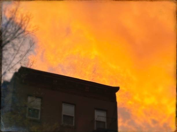 istock Orange Clouds Over Brooklyn, NY USA 1291289889