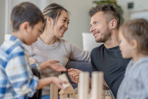 istock Multi-ethnic family enjoying quality time 1291295439