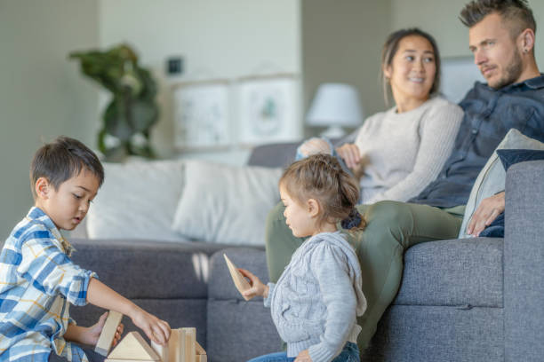 istock Multi-ethnic family enjoying quality time 1291295440