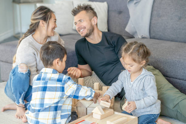 istock Multi-ethnic family enjoying quality time 1291295441