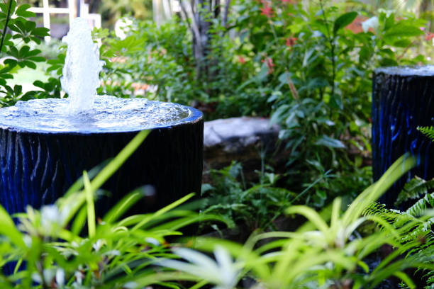 istock fountain on blue water jar decorating in garden 1291300160
