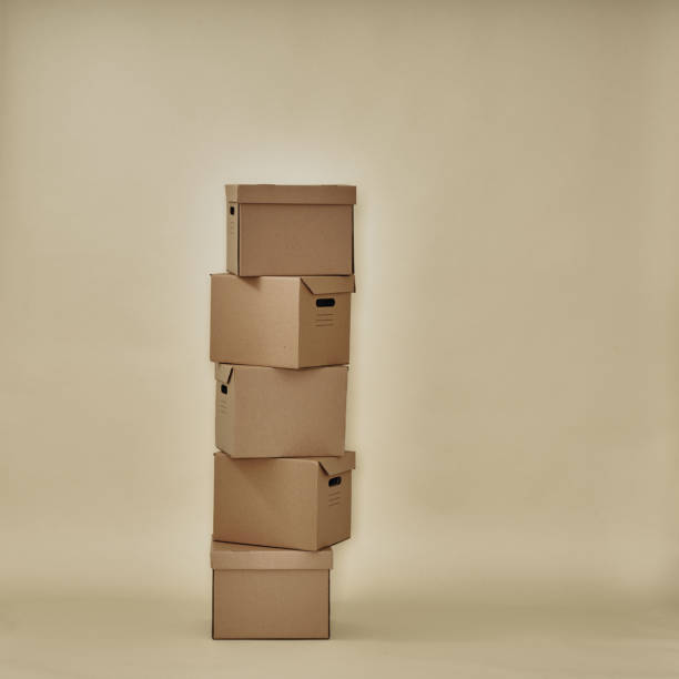 istock Cardboard boxes are stacked on top of each other, storage. Moving and packaging, environmentally friendly materials. Archive. 1291300296
