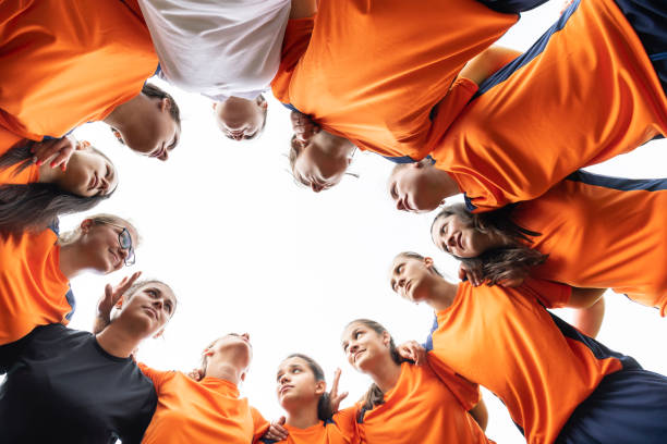 istock Low angle view of female soccer team 1291300654