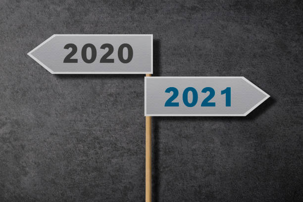 istock 2020 And 2021 Two Directional Road Sign 1291302945