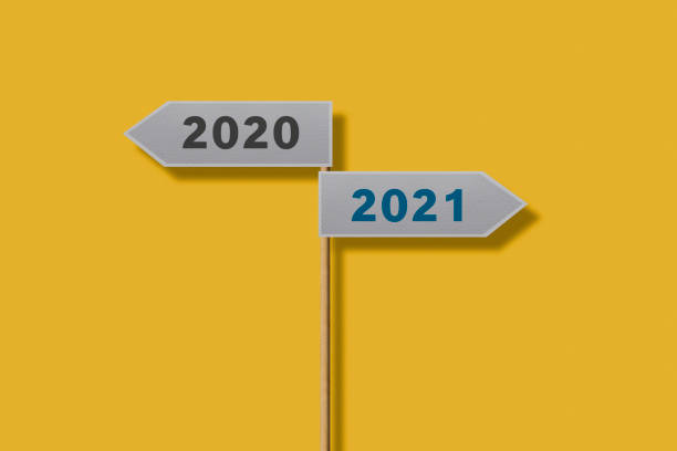 istock 2020 And 2021 Two Directional Road Sign 1291303197