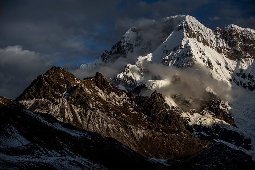 Scenic photo of mighty snowcapped  Ausangate mountain in Peruvian Andes.