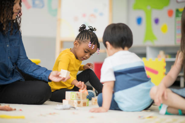 istock Playing together at preschool or daycare 1291308161