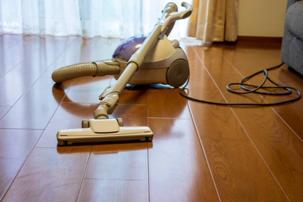 istock Cleaning wood flooring with vacuum cleaner 1291308954