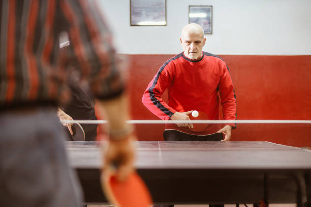 istock Seniors play table tennis 1291312339