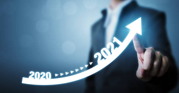 istock Businessman pointing arrow graph corporate future growth plan. Business development to success and growing growth year 2020 to 2021 concept 1291313085