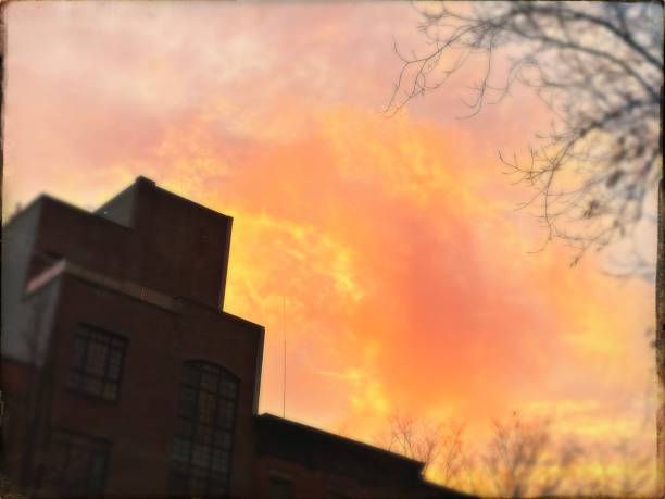 istock Orange Clouds Over Brooklyn, NY, USA 1291313112