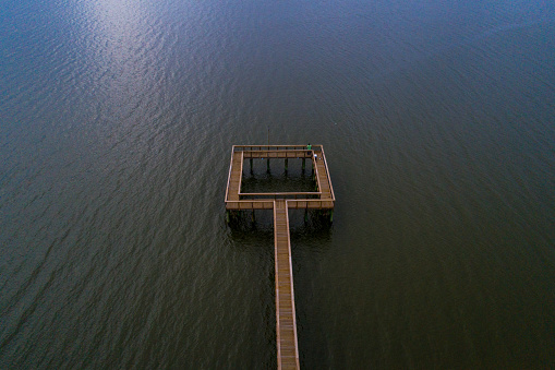 Aerial view of a pier on Mobile Bay in Daphne, Alabama