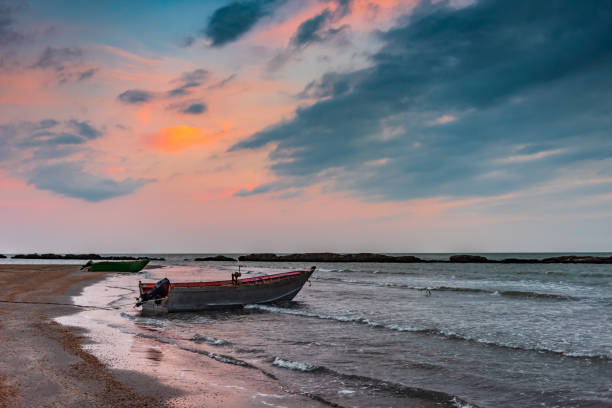 Fishing boat by the sea shore