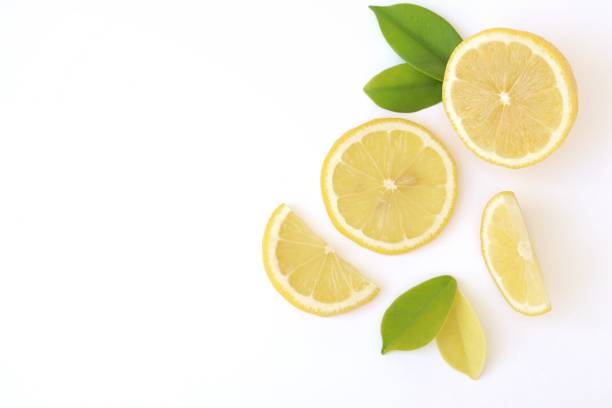 istock Sliced of lemon and leaf isolated on white background 1291320380
