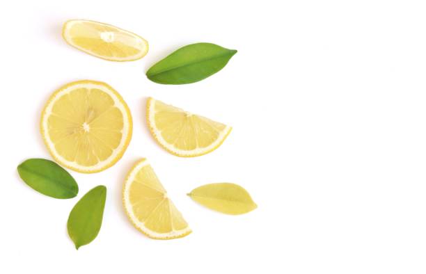 istock Sliced of lemon on white background 1291320610