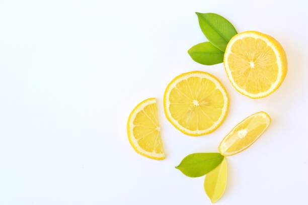 istock Sliced of lemon isolated on white background. Clipping path 1291320623