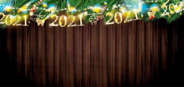 Vector illustration of Fir Branches with Neon Lights and 2021 Text. Christmas Decoration with Colorful Twinkles.