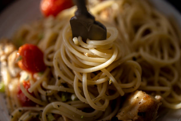 istock home cooked spaghetti, with sole fish fillet and cherry tomato 1291331992