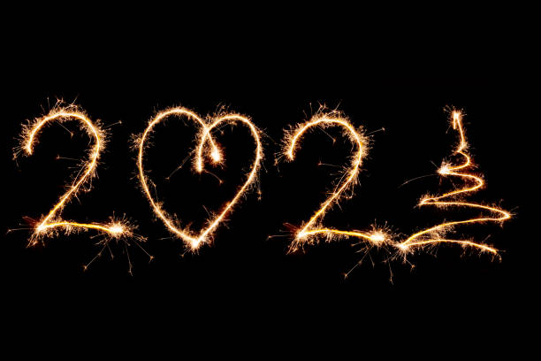 istock 2021 written with Sparkle firework on black background, happy new year 2021 concept 1291334442