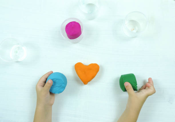 istock colored mass for modeling, decorative dough for children's creativity, baby made a heart 1291335528