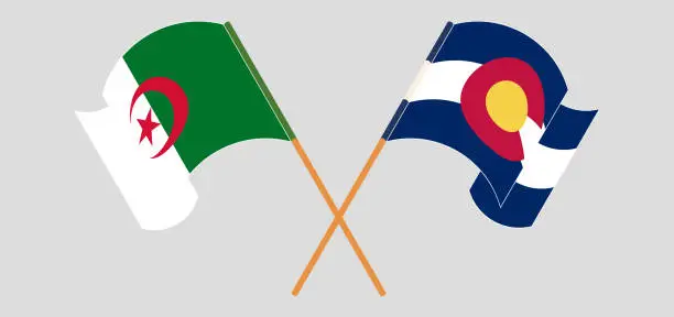 Vector illustration of Crossed and waving flags of Algeria and The State of Colorado