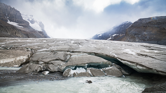 Columbia Ice Field Glacier Panorama under dramatic cloudscape in the Canadian Rocky Mountains. Banff National Park, Banff - Jasper Cities, Canadian Rocky Mountains, Canada, North America.