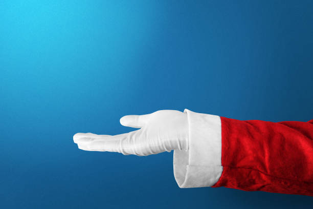 istock Santa Claus with an open hand gesture with a colored background 1291340736
