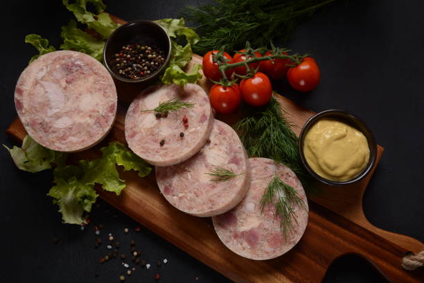 istock Homemade headcheese with dill and mustard, and cherry tomatoes 1291340839