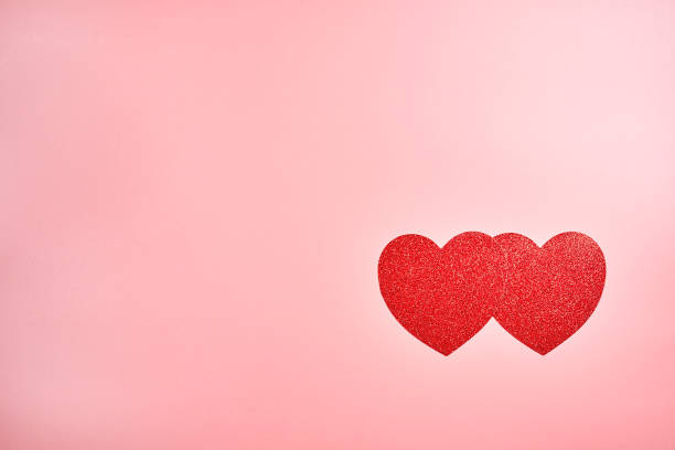istock Red decorative hearts on a  background. Valentine's Day Concept. 1291344913