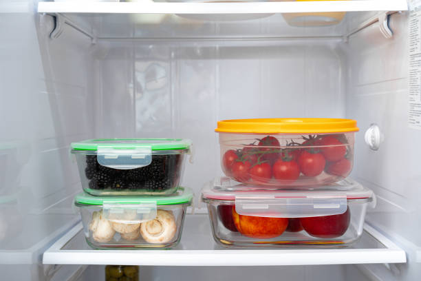 istock Storage containers with fresh food in a fridge 1291345487