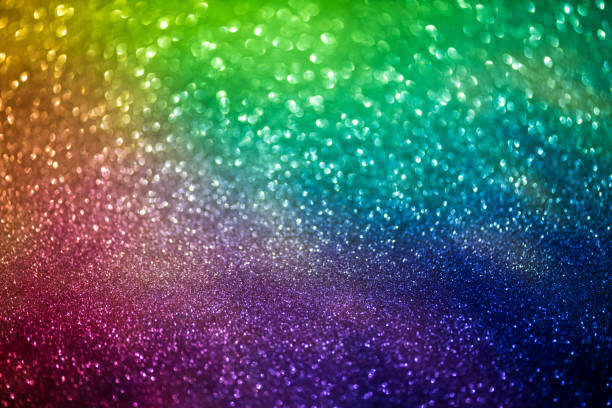 istock bokeh effect glitter colorful blurred abstract background for birthday, anniversary, wedding, new year eve or Christmas 1291350758