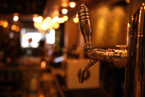 istock Close-up of a beer tap at pub. 1291351662