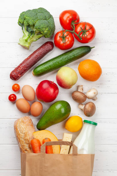 istock Different food in recycling paper bag 1291355966