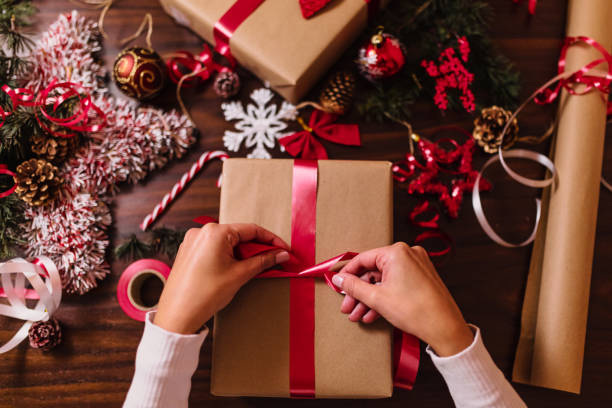 istock Wrapping Christmas gifts 1291356927
