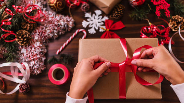 istock Wrapping Christmas gifts 1291357758