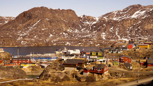 Sisimiut village Impressions with colorful painted houses at the start of the Arctic Circle Trail on the East coast of Greenland. stock photo