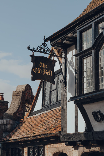 Rye, UK - October 10, 2020: Sign outside The Olde Bell inn, also known as Ye Olde Bell, is a Grade II listed historical inn in Rye, East Sussex, built in 1390.
