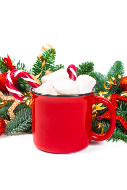istock Cocoa mug and baubles on white 1291364347