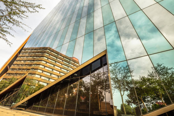 istock Glass facade reflection from a skyscraper in Johannesburg 1291364637