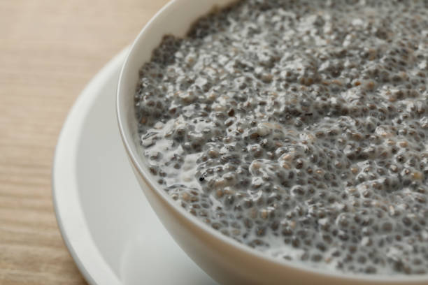 istock Bowl with chia pudding on wooden background 1291364791