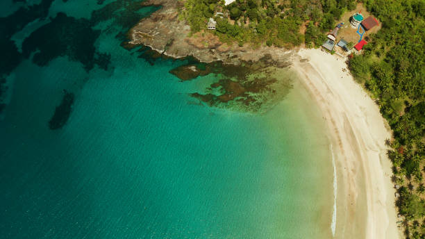 istock Tropical beach with white sand, view from above 1291365354