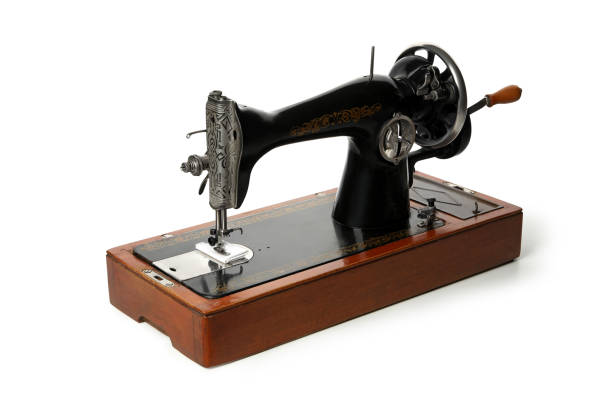istock Old vintage sewing machine isolated on white background 1291367214