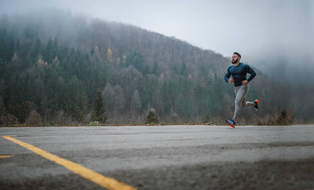 istock Professional athlete running outdoor. 1291367447