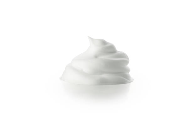istock Shaving foam isolated on white background, close up 1291368829