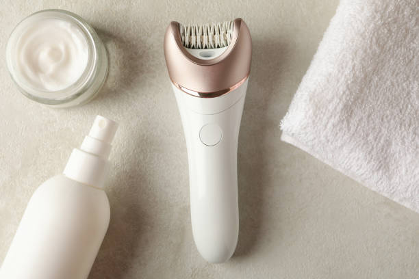 istock Concept of skincare with epilator on white table 1291368966