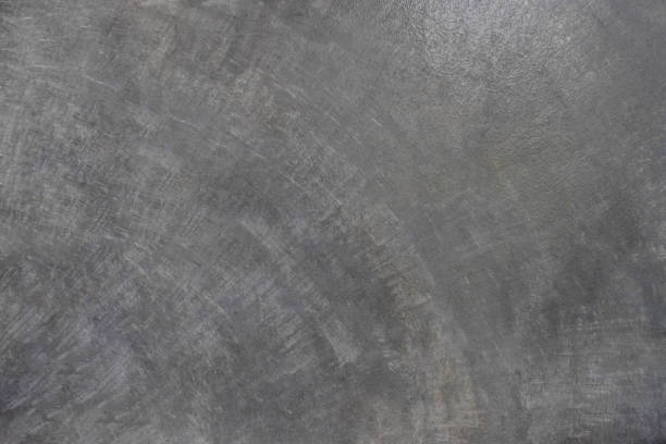 istock Concrete gray grunge wall. old abstract texture as a retro pattern texture of old dirty cement color grey wall for background. 1291371437