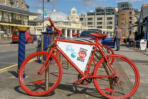 Porthcawl, Wales - August 2018: Bike parked near the ton centre. They are available for hire in a bicycle sharing system.